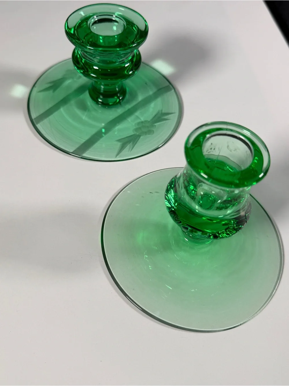 Mismatched Fostoria pair of Green Glass Candle Holders, one etched glows,